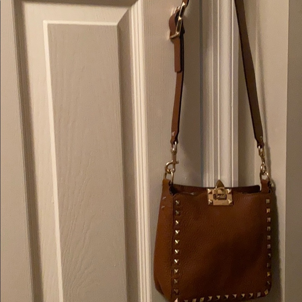 Mini Valentino Garavani StuddedHobo Crossbody Bag.